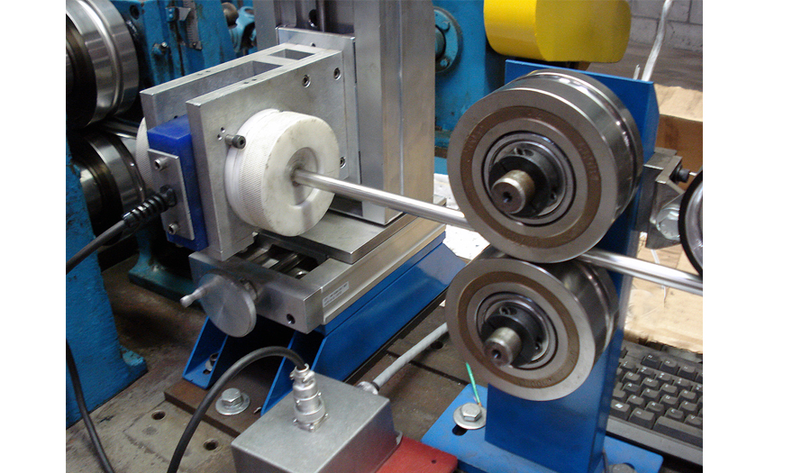 <p>Eddy Current Encircling Coil unit Inspecting Stainless Steel Welded Tube as part of a MultiMac® test system.</p>