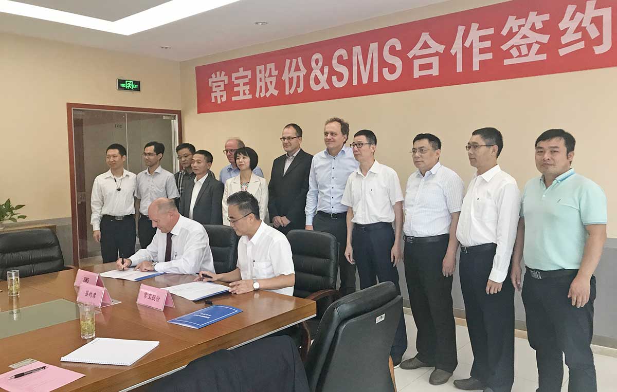 The ChangBao and SMS group project teams during contract signing ceremony.